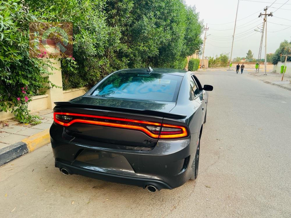دۆج چارجەر